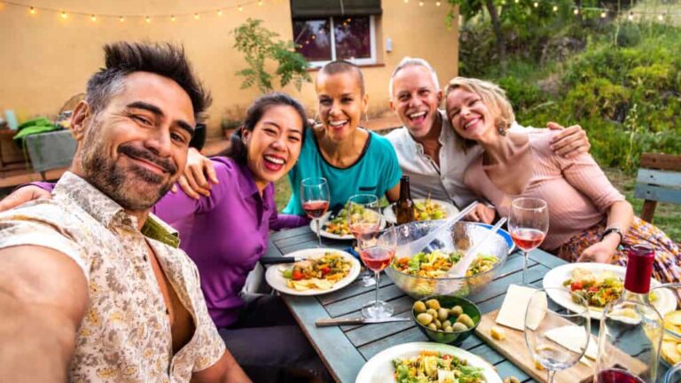 50947988 Happy Group Of Friends Laughing Taking Selfie During Barbecue Dinner Party Outdoors E1681400746655 768x432 
